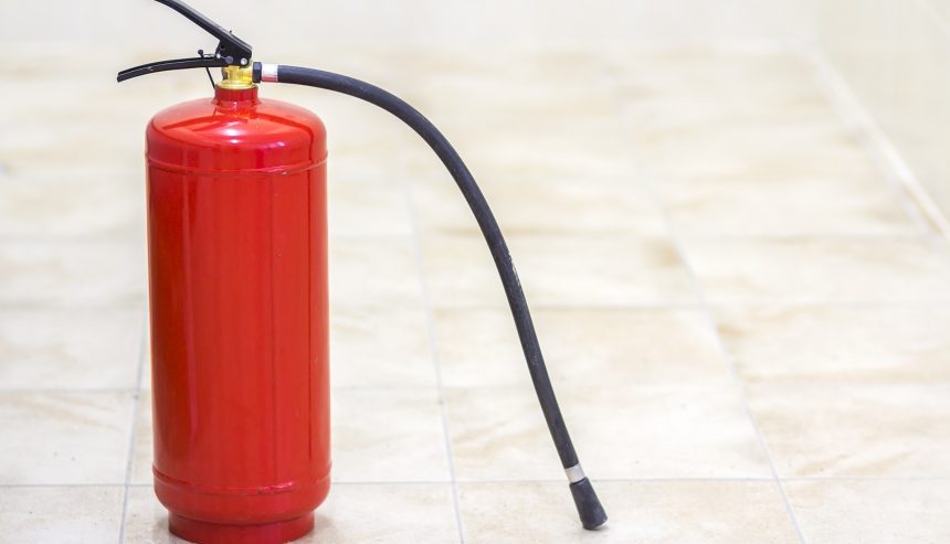Fire extinguisher isolated on white background image