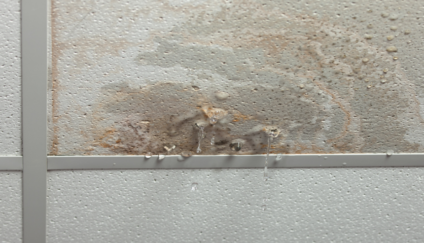 water damage in commercial buildings can start small like this dripping ceiling, and get much worse quickly