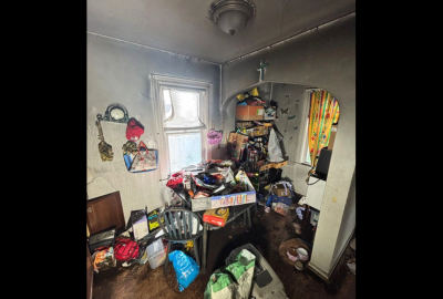 Professional emergency fire damage cleanup services restoring residential property after a fire.