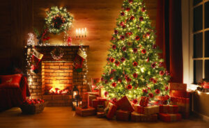 A decorated Christmas tree with presents, a cozy fireplace, and festive decorations in a warm, inviting room.