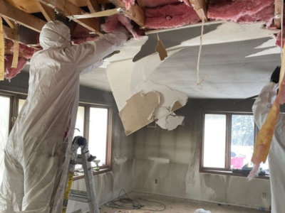 PuroClean team restoring a fire-damaged home in Orland Park, removing debris and repairing structural damage.