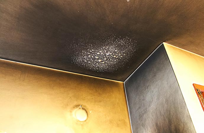 Smoke residue on walls and ceilings