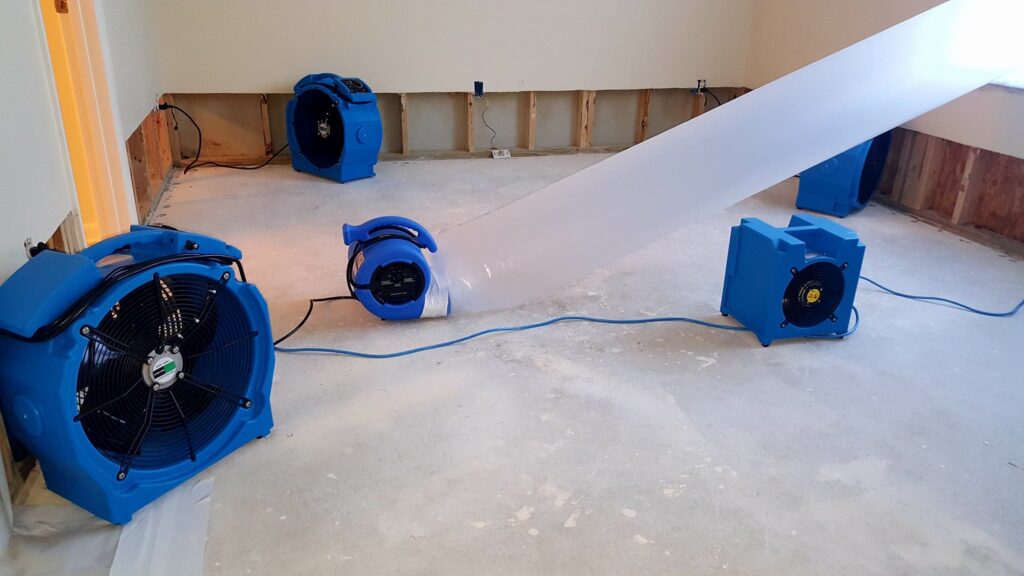professional water damage drying equipment air movers dehumidifiers home interior