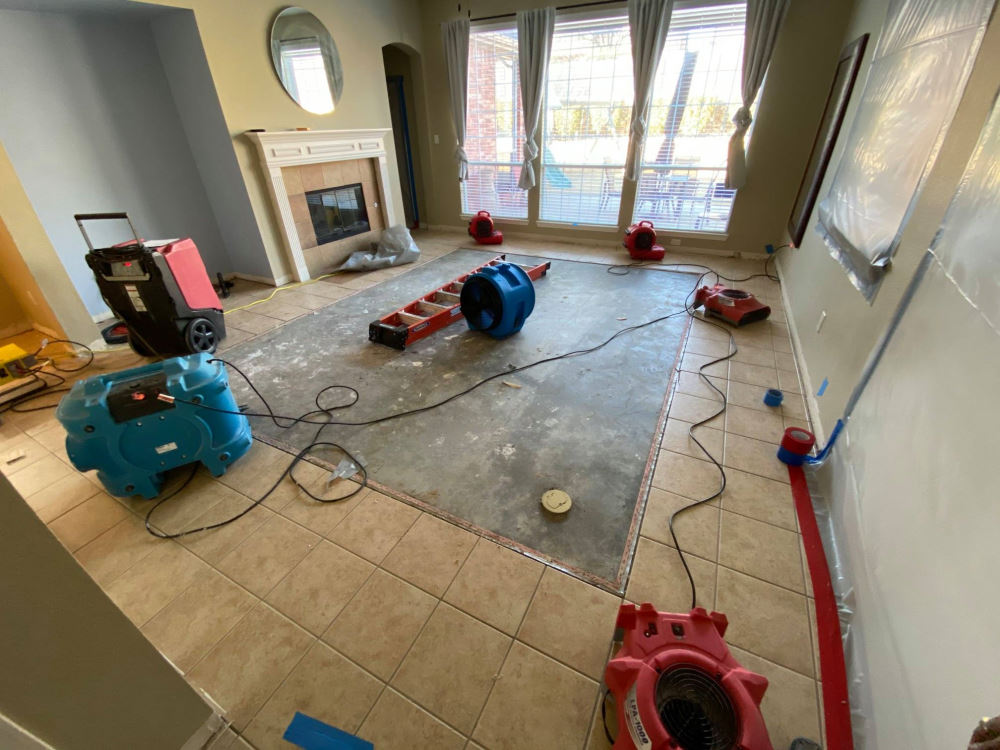 water mitigation drying equipment setup inside residential home