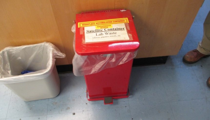 Close-up of hazard disposal containers prepared for proper remova
