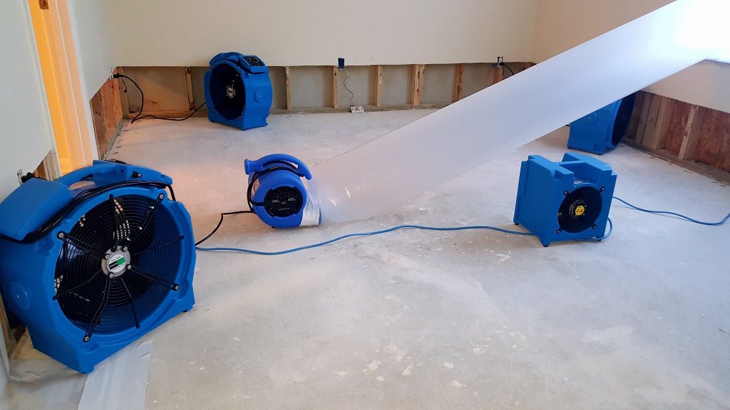 professional water damage drying equipment air movers dehumidifiers home interior