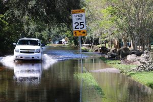 Waterfront home near the Halifax River in Ormond Beach FL experiencing tidal flooding and water damage requiring professional water damage restoration