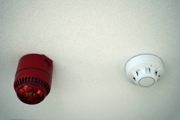 Red alarm siren and smoke detector