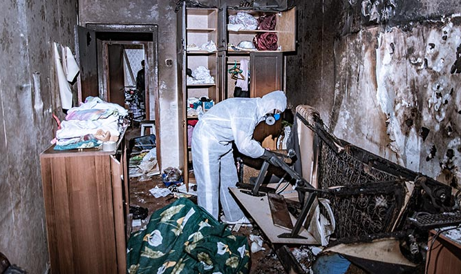 fire damaged room illustrating why fire damage restoration cost varies so widely based on severity