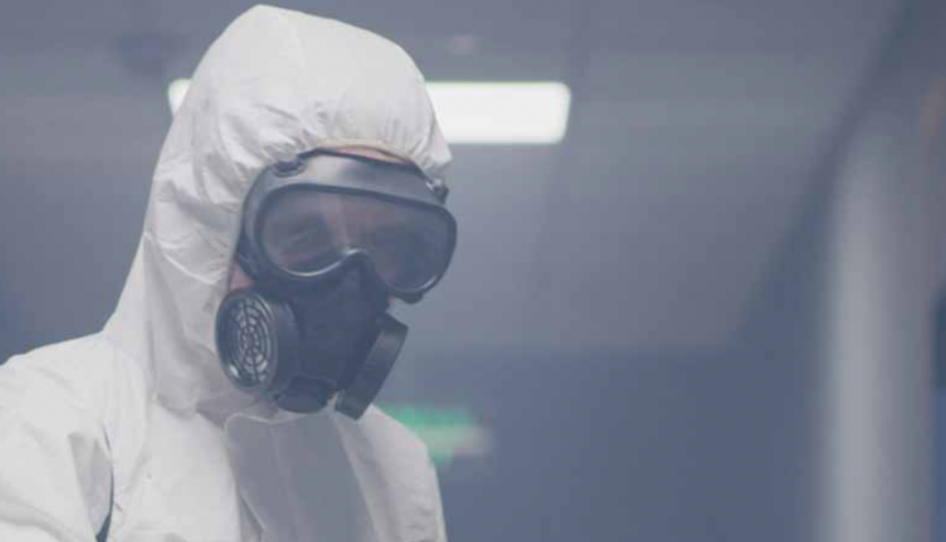 Certified technician performing smoke damage cleanup services in Plantation FL home