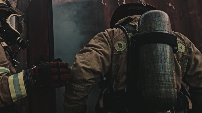 Firefighter in a fire and rescue operation before Fire and Smoke Damage Restoration in Fort Lauderdale: What to Do in the First 2 Hours