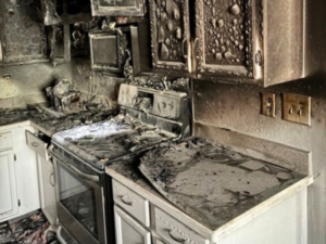 Professional emergency fire damage cleanup services restoring residential property after a fire.