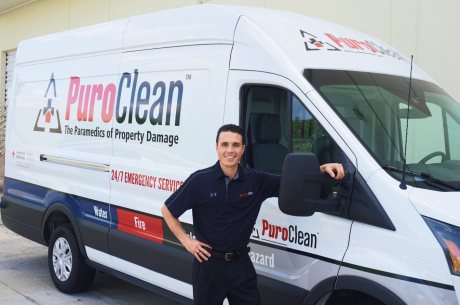 PuroClean technician with van stating Paramedics of Property Damage