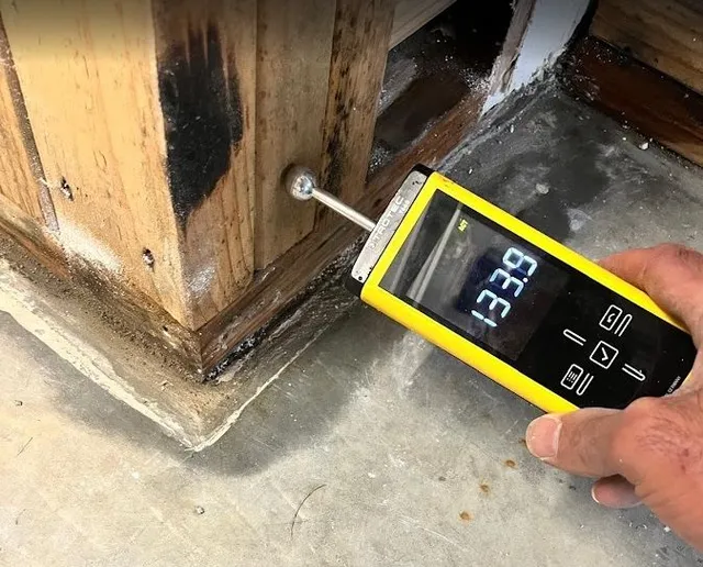 PuroClean technician identifying hidden moisture sources in a Rancho Cucamonga kitchen