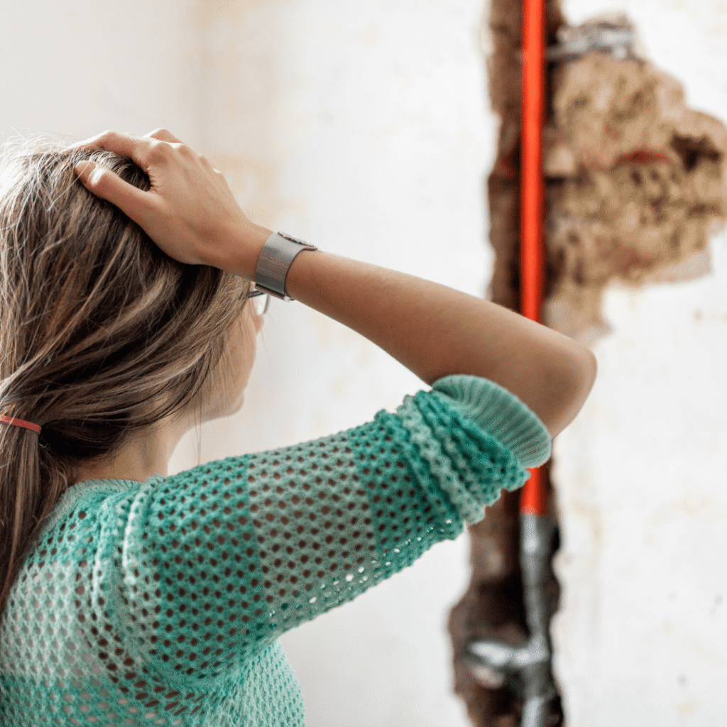  woman worried about water damage