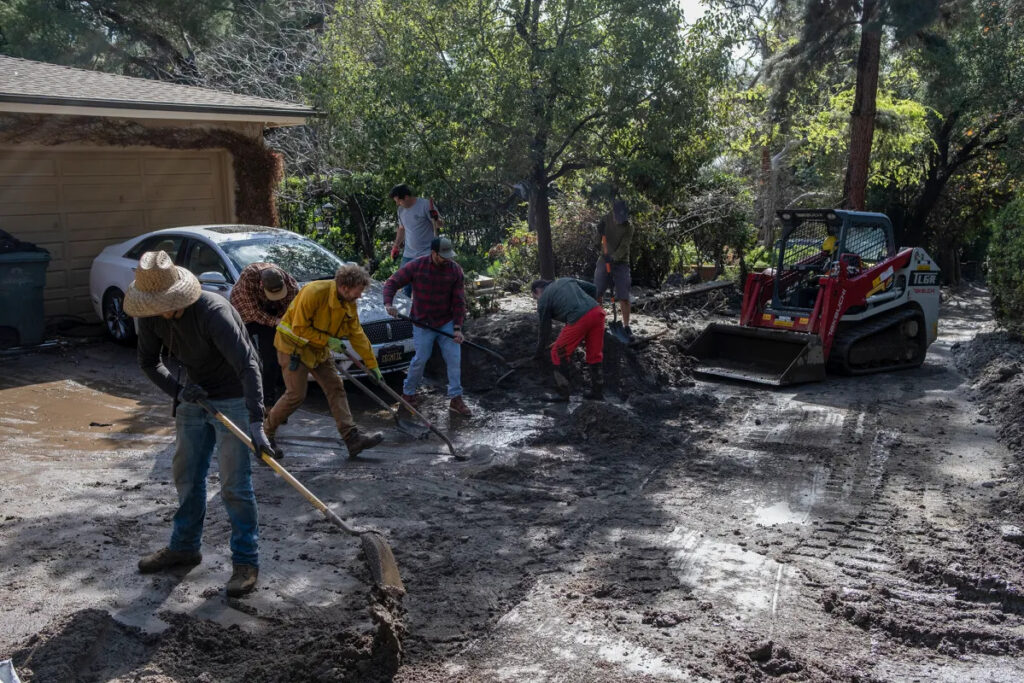 Sediment and debris flow damage at a residential property near the San Gabriel Mountain foothills in Rancho Cucamonga CA requiring specialized emergency water restoration response