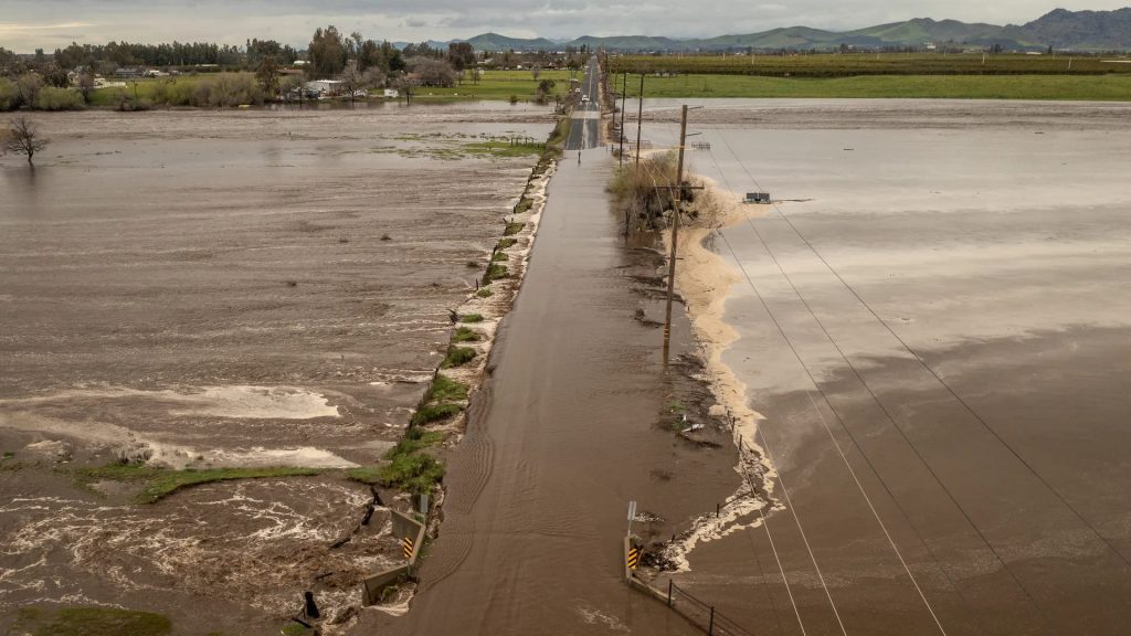 Residential street flooding in Rancho Cucamonga CA caused by an atmospheric river storm event requiring emergency water restoration response