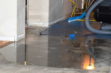 Water extraction taking place inside a residential property
