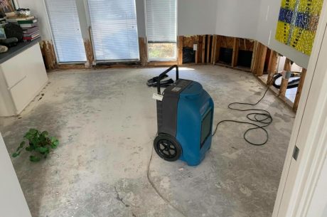 water damage restoration professionals inspecting moisture in home Ridgewood New Jersey