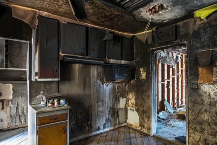 fire damage restoration professionals working inside residential home Alpine New Jersey