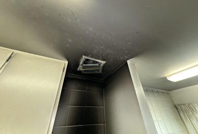 fire and smoke damaged walls and ceiling from stove fire