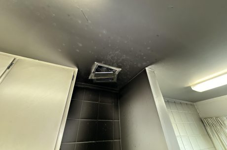 fire and smoke damaged walls and ceiling from stove fire