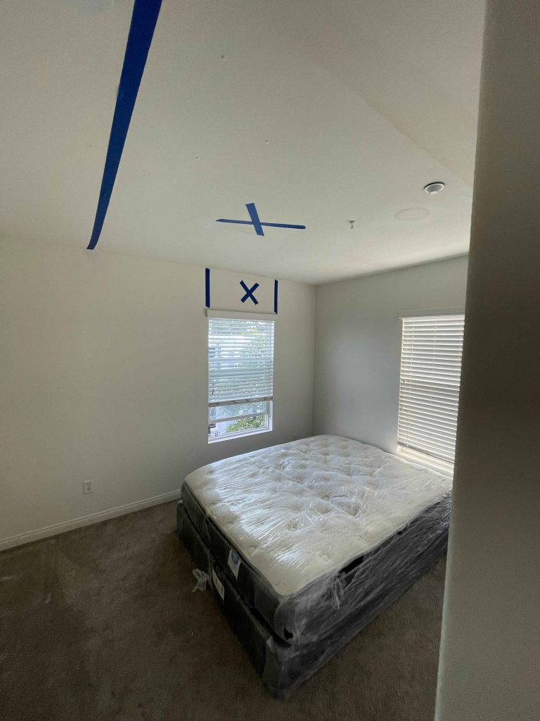 Our inspection concluded with us finding elevated levels of moisture in the ceiling and above the window sills.