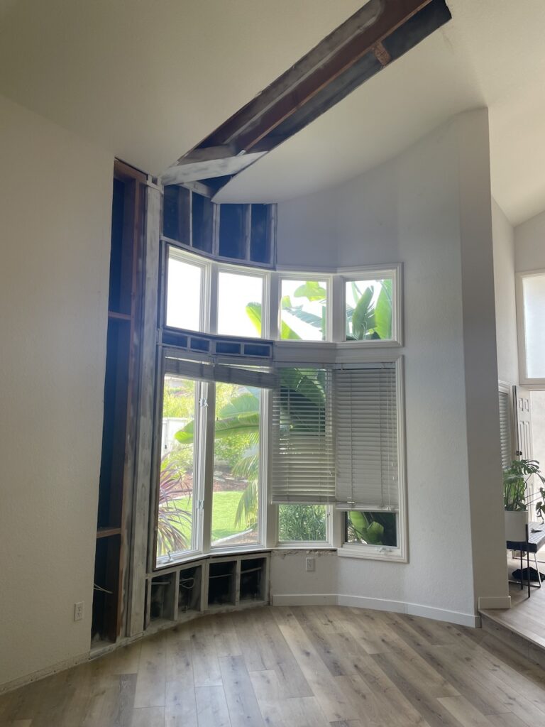 The damage caused by the category two roof leak.