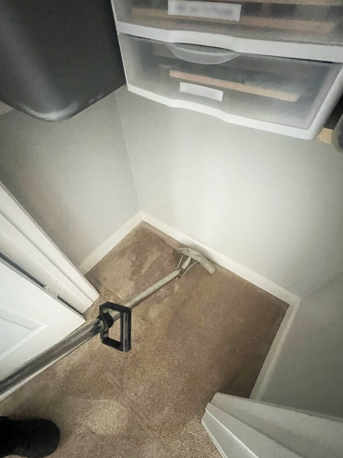 Extracting standing dirty water from carpet. 