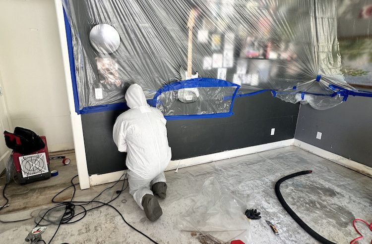 Our team hard at work during a category 3 water damage job