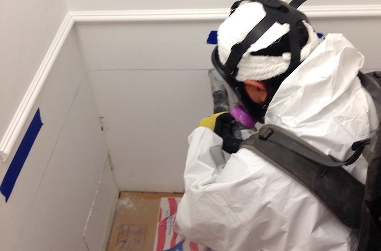 Technician on site of a category 3 water loss job