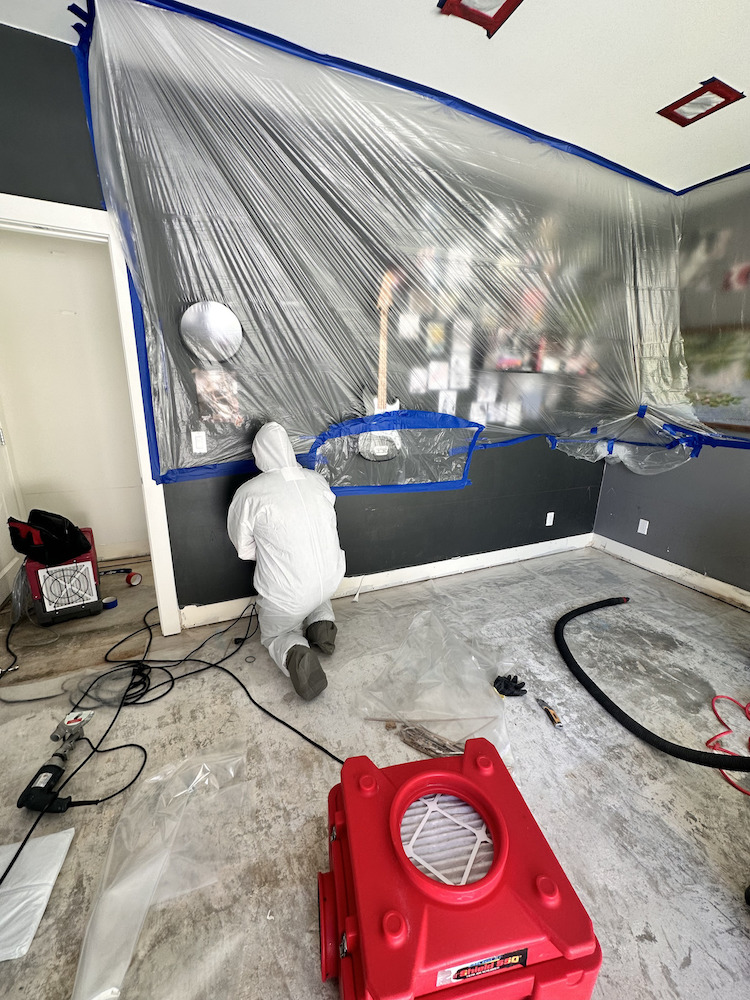Our team hard at work during a category 3 water damage job