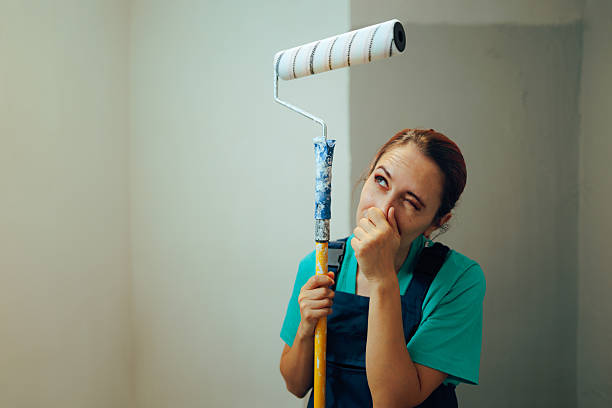 is white mold dangerous if you painted over it