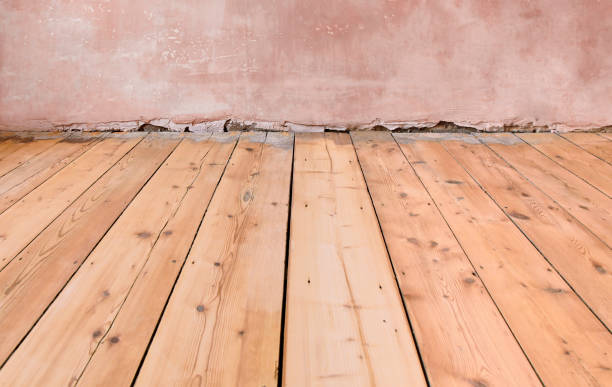 what causes moisture under hardwood floors