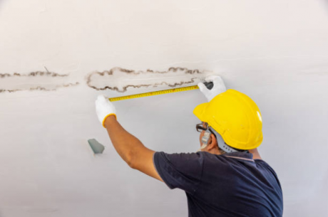 best insurance claim restoration in Blue Bell PA - PuroClean technician assessing flood damage