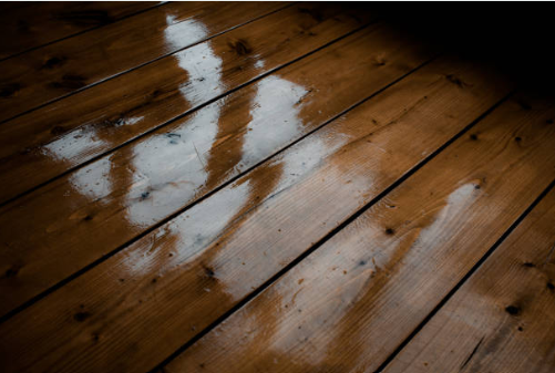 hardwood floor water damage repair severely cupped and buckled boards in Montgomery County PA home
