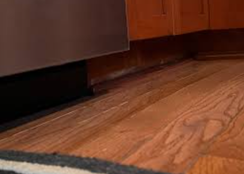 dishwasher leak floor damage warped hardwood kitchen floor