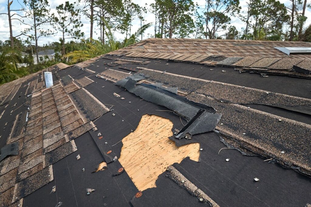 damaged shingles after storm in Merced