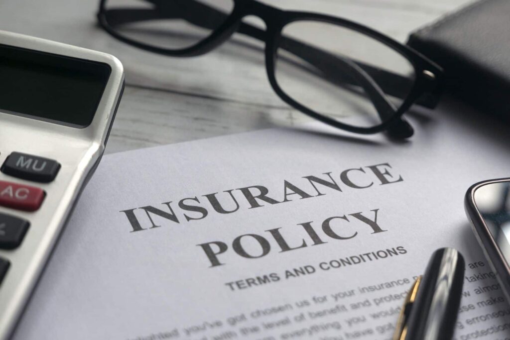 insurance policy on table