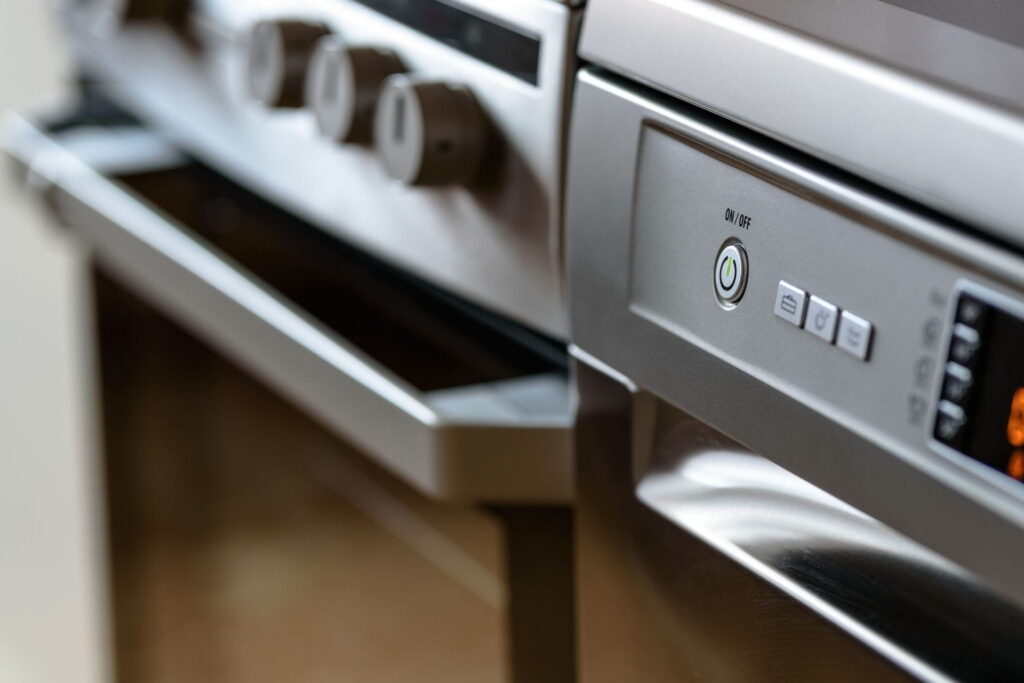 Close up of the front of an oven and stove top