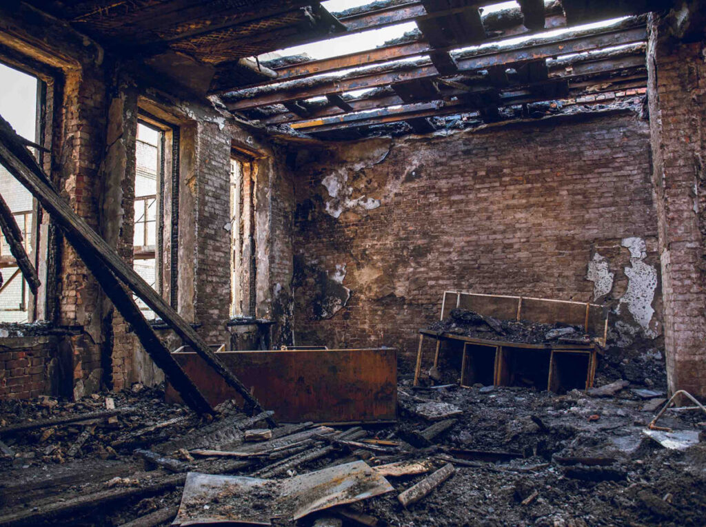 Severe fire damage inside residential building