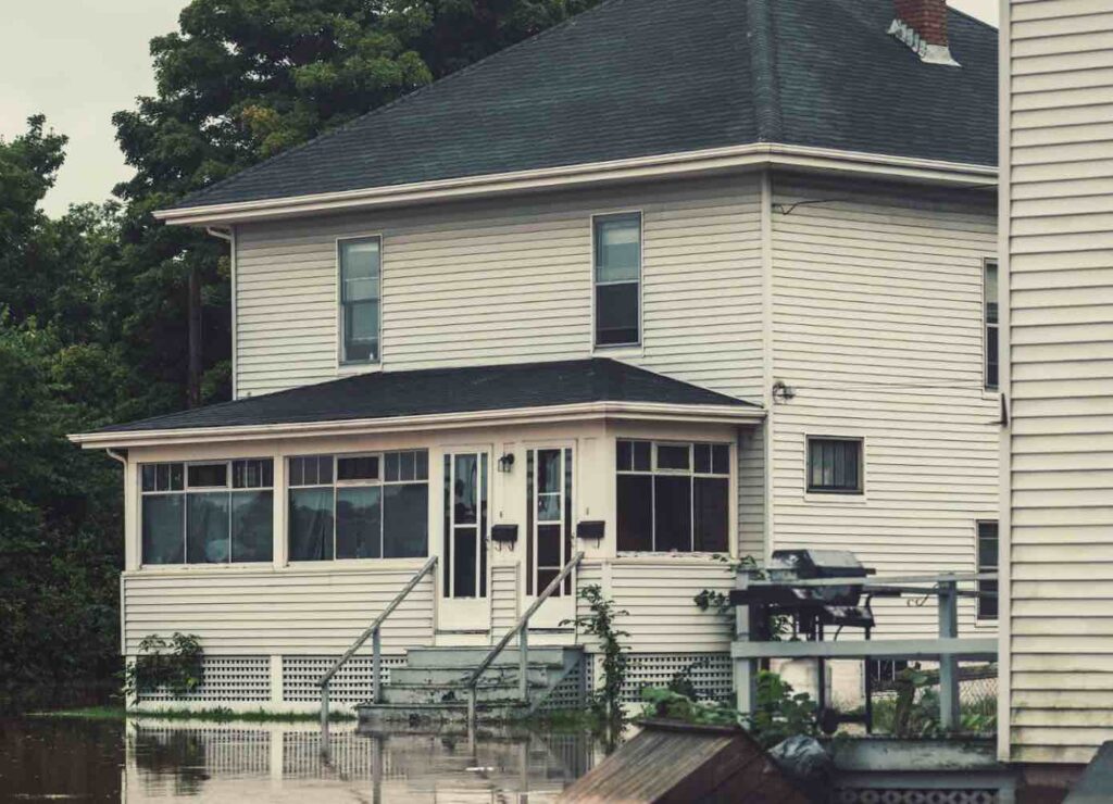 Flood damage restoration message with house image
