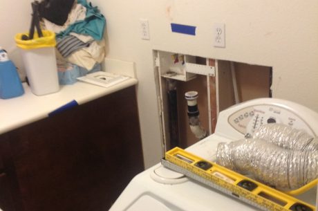 Washing machine malfunctioned causing water damage to the laundry room.