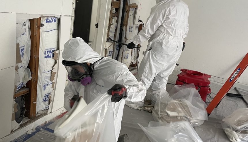 Our team repairing the damage caused by the sink supply line leak.