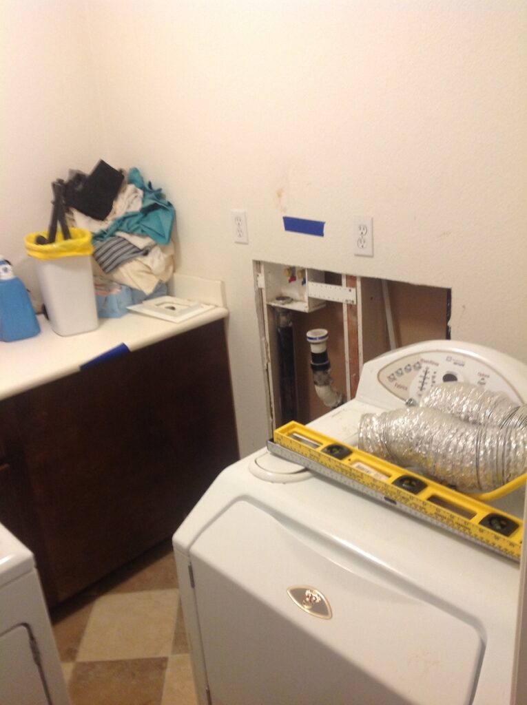 Washing machine malfunctioned causing water damage to the laundry room.
