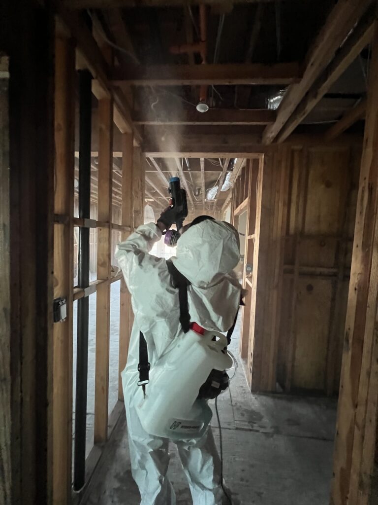 Our technician inspecting the home after the water supply line burst.
