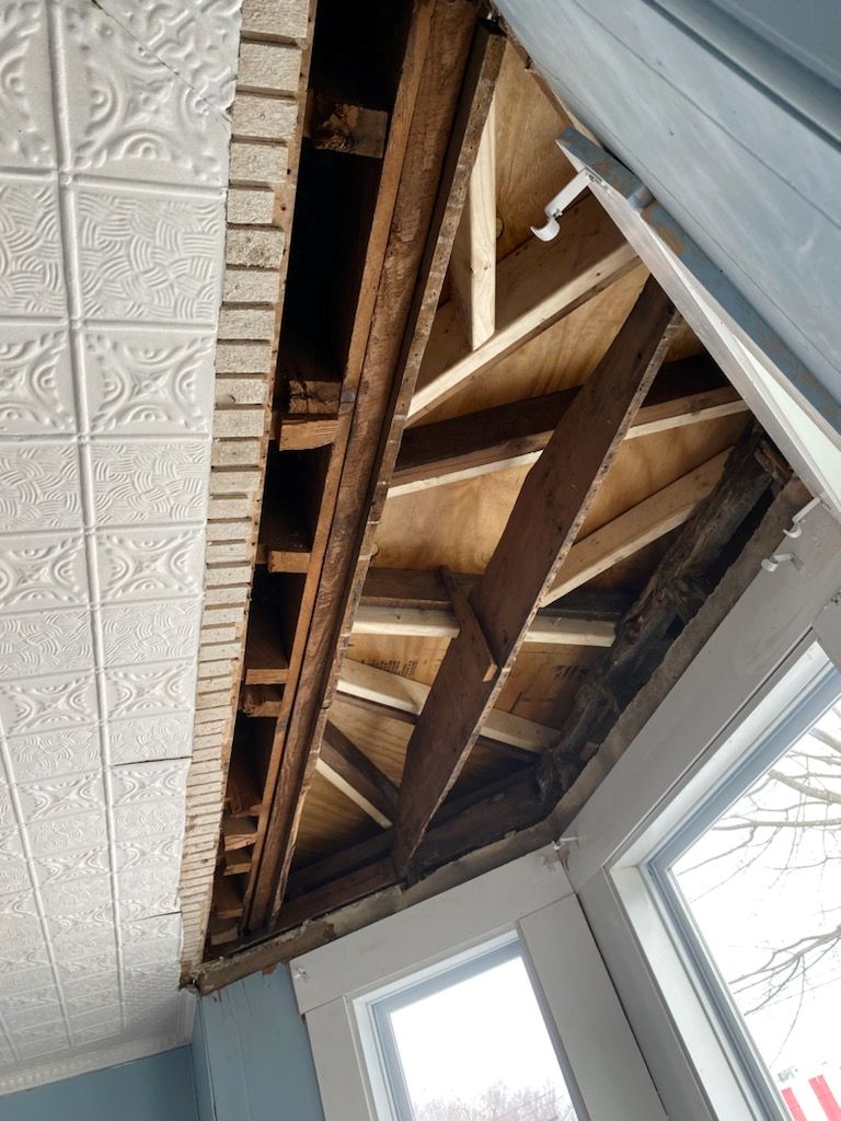 Rochester NH older home with Water Damages requires asbestos testing due to common hazards in homes older than 1990