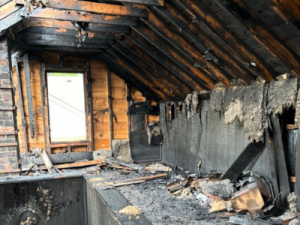 Professional emergency fire damage cleanup services restoring residential property after a fire.