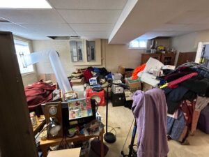Water Damage Restoration in Terre Haute. Homeowner basement flood due to bathroom back up.