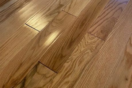 The hardwood floors experienced water damage.